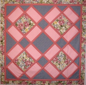 Garden tiles quilt in pinks and blues