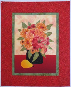 A rose floral arrangement made using the Broderie Perse technique.