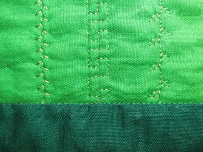 Begin and end the decorative stitch with 5 or 6 tiny staight stitches to lock the thread