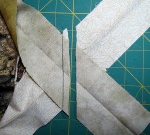 Cut the loose ends to make a 1/4 to 1/2 inch seam allowance
