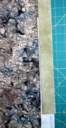 Place ending tail on top of beginning tail along quilt edge