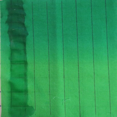 Amodex rubbed in over the left (unironed) marked line