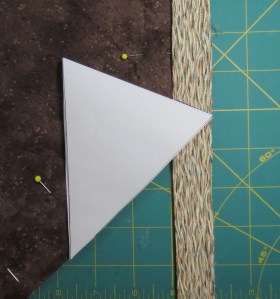 Fold the template in half to mark corner