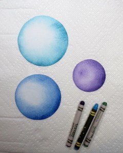 Spheres colored with melted crayons - second try