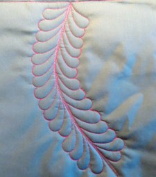 feather pattern stitched out