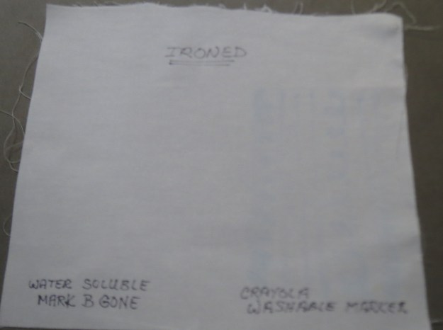 Scrubbed with warm soapy water, and finally all the marks disappeared. There were faint shadows left by the Crayola markers.